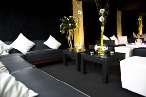 Black and white party seating in a Surrey marquee