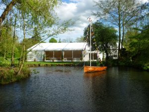 Marquee hire in Surrey, marquee over next to a lake