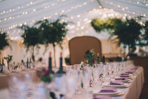 Marquee pictures a wedding marquee image featuring festoon lighting and floral decoration